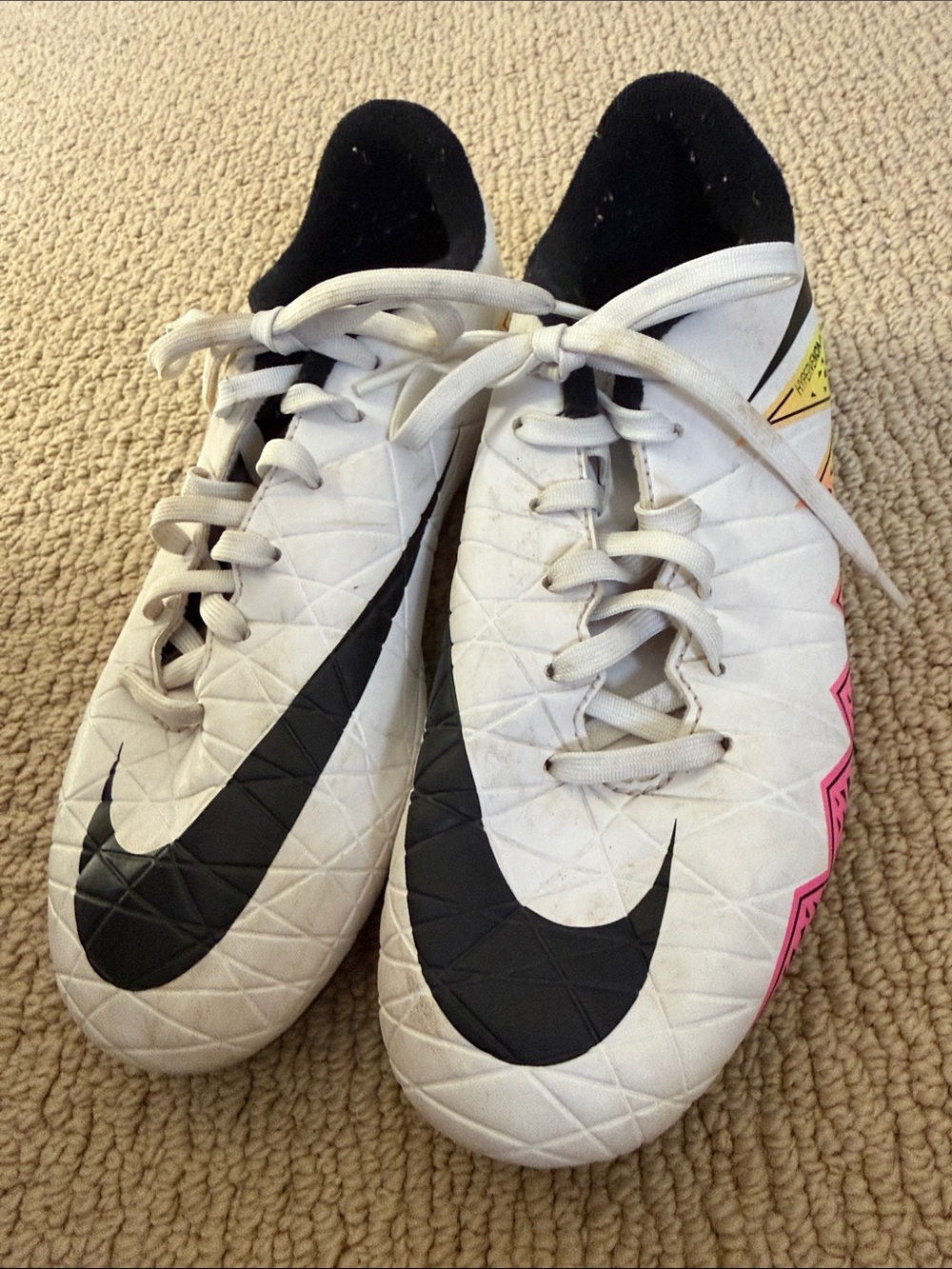 Like new Nike White Soccer Cleats with Black Swoosh and Pink Accents